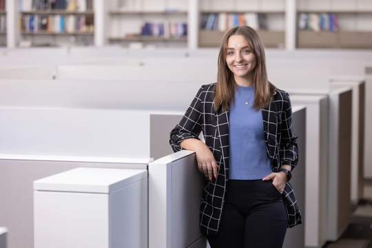 portrait of a smiling person in professional attire